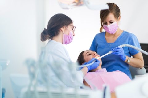 General dentist discussing regular dental visits with a patient in Whittier, CA